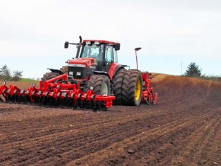 Front-Roller-in-field-seed-drill-in-back.jpg