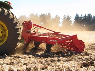 Sub-Tiller-on-hot-summer-day-subsoiling-field.jpg